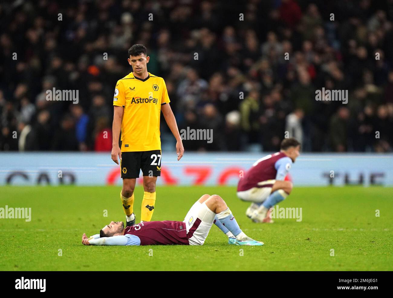 Aston Villa's Emiliano Buendia and Wolverhampton Wanderers' Matheus Nunes react following the Premier League match at Ashton Gate, Birmingham. Picture date: Wednesday January 4, 2023. Stock Photo