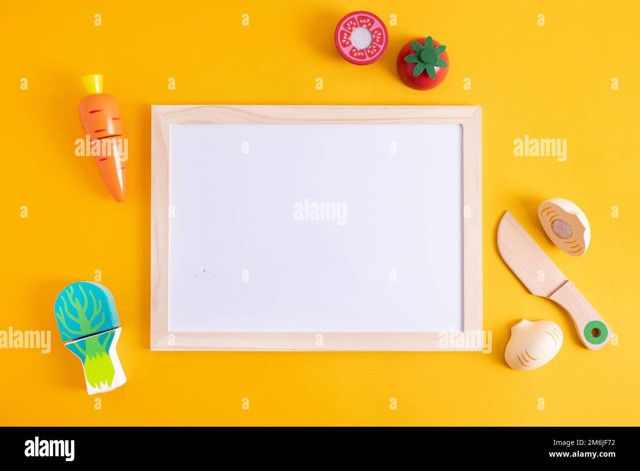 Chalkboard writing board with wooden kid toy for decoration design. Copy space background, child education Stock Photo