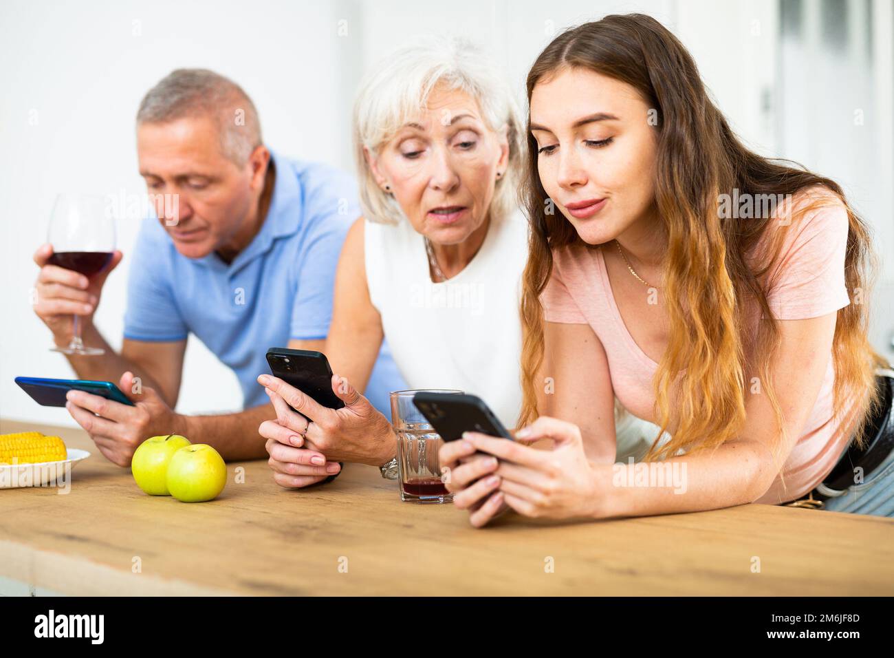 Family enjoying online internet content Stock Photo - Alamy