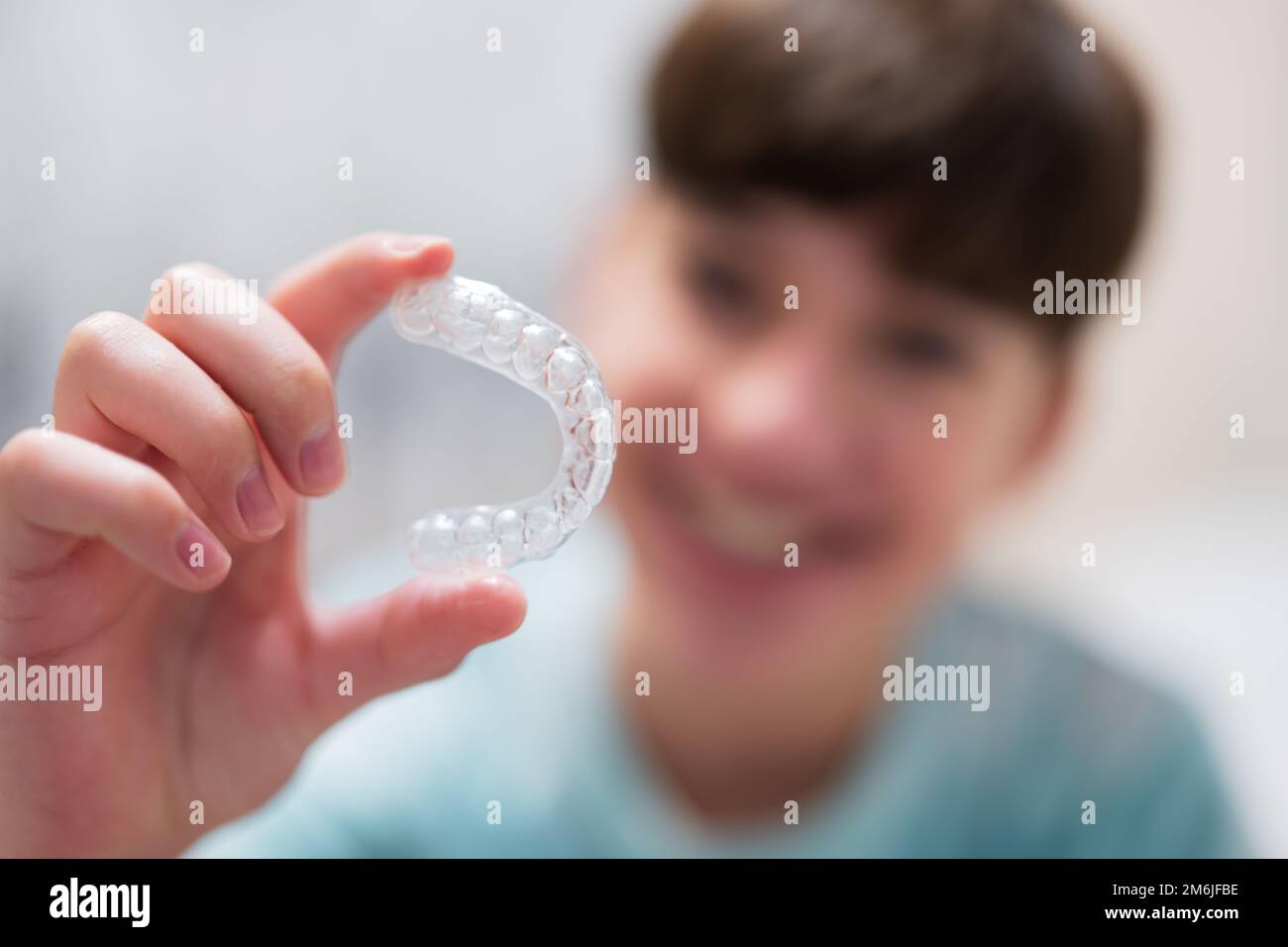 Teenager boy wear simulator orthodontic silicone invisible leveling