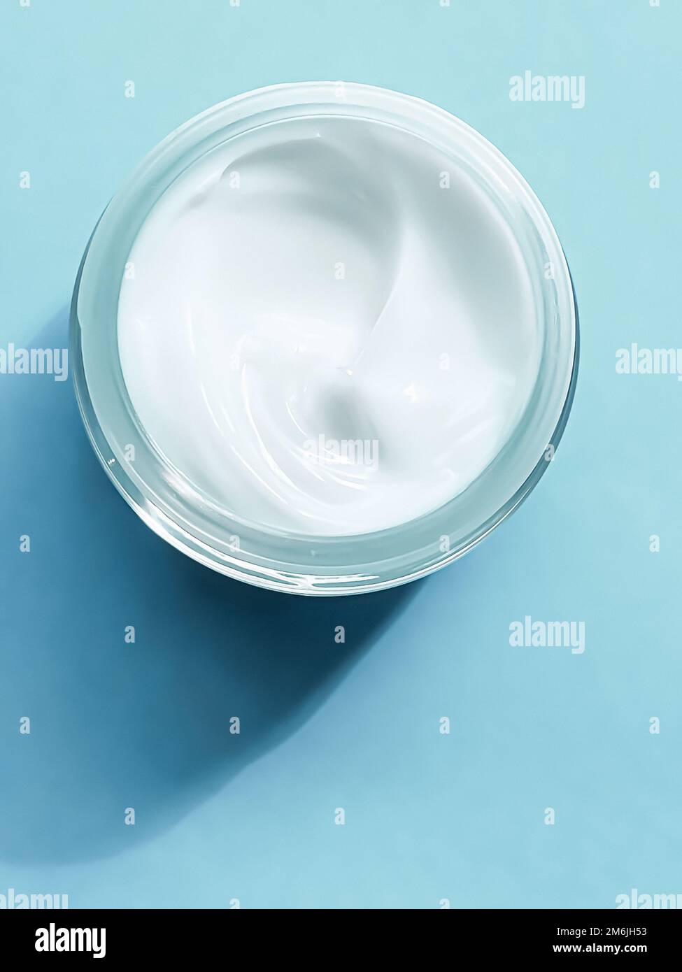 Face cream moisturiser jar as product sample on mint background, beauty and skincare, cosmetic science Stock Photo
