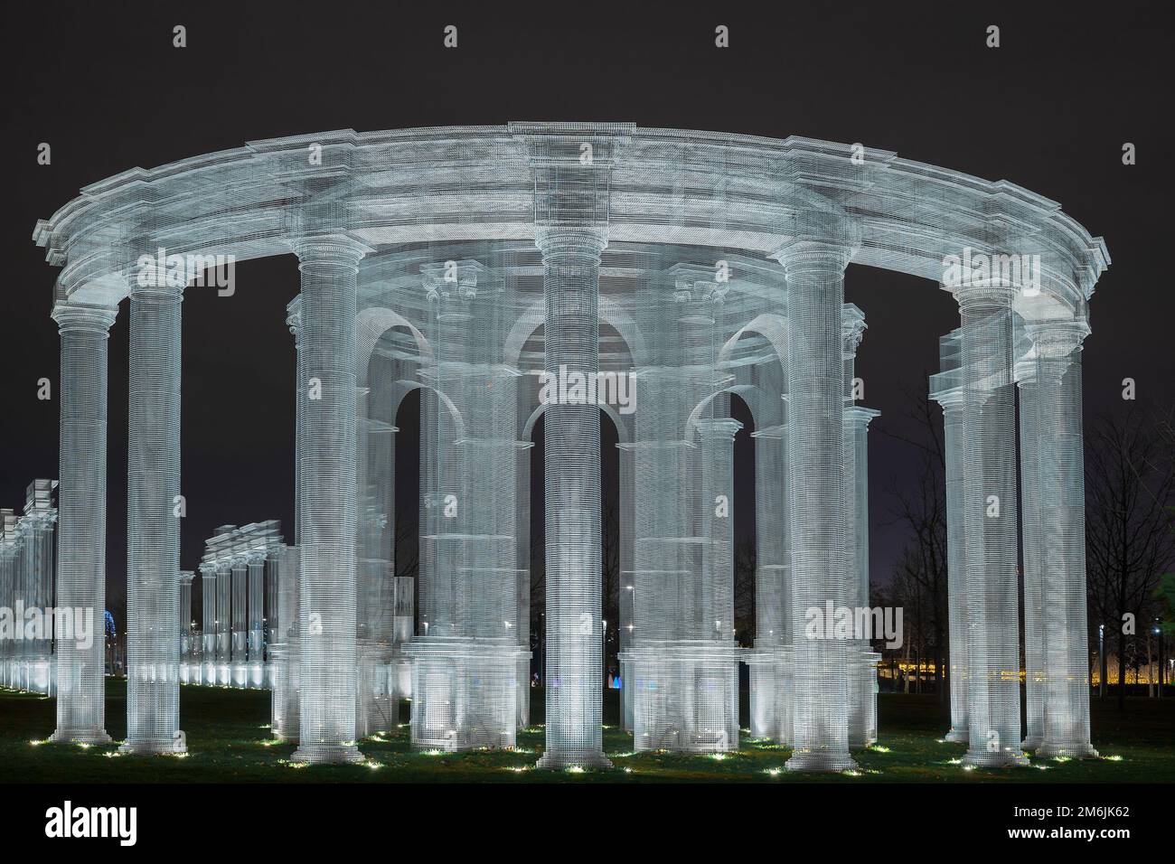 Russia,Krasnodar 07.01.2022. Luminous huge colonnade in Roman style decorates the park at night. Stock Photo