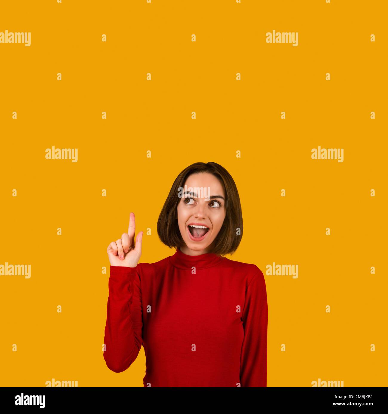 Woman pointing upwards hi-res stock photography and images - Alamy