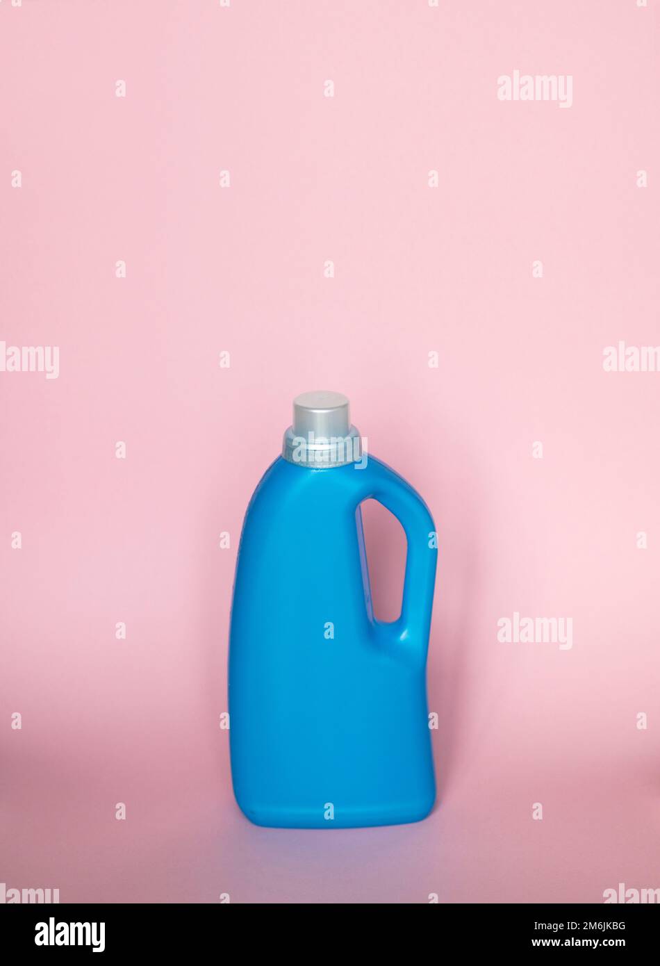 Blue plastic bottle for liquid laundry detergent or cleaning agent or