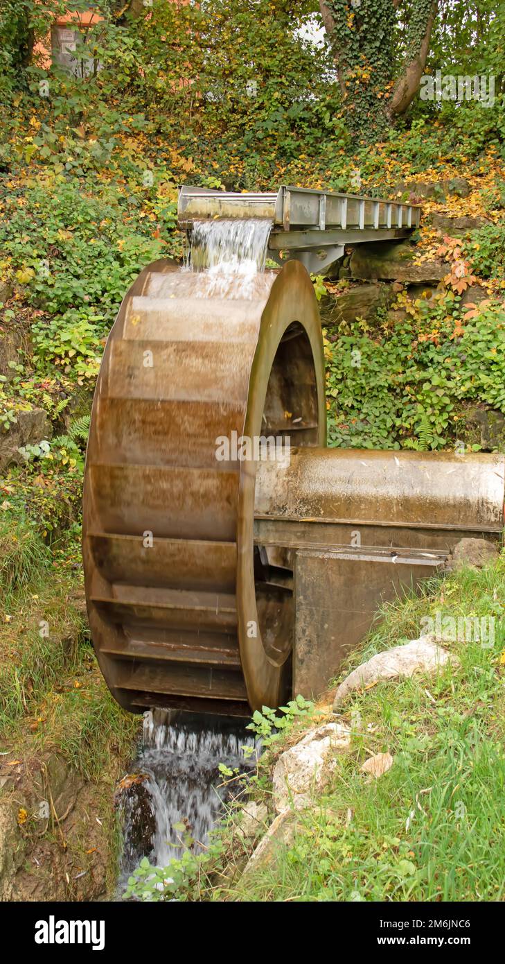Water wheel public utility Engen Stock Photo - Alamy