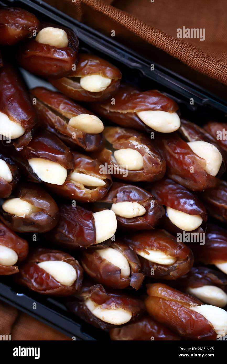 Dates with nuts inside. Oriental sweets. Stock Photo