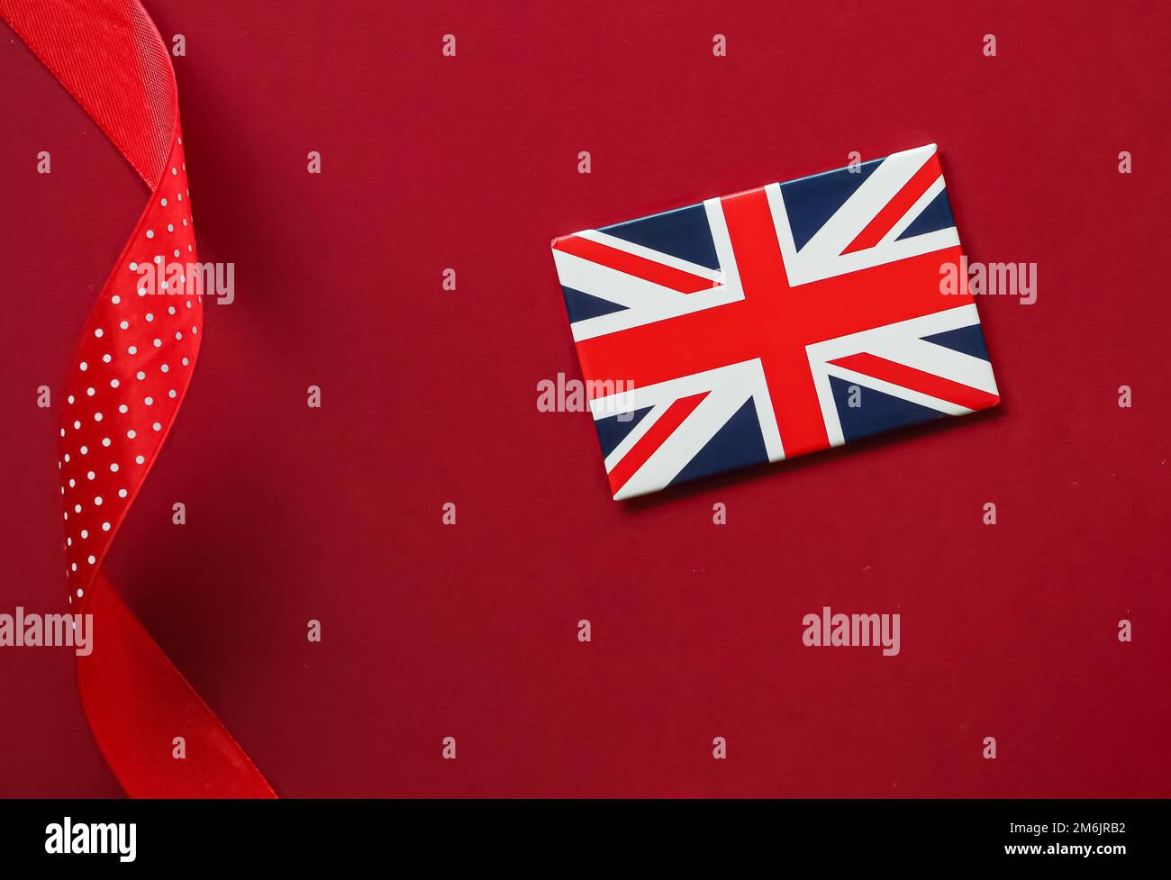 Union Jack flag of Great Britain on red background, Queen\'s ...