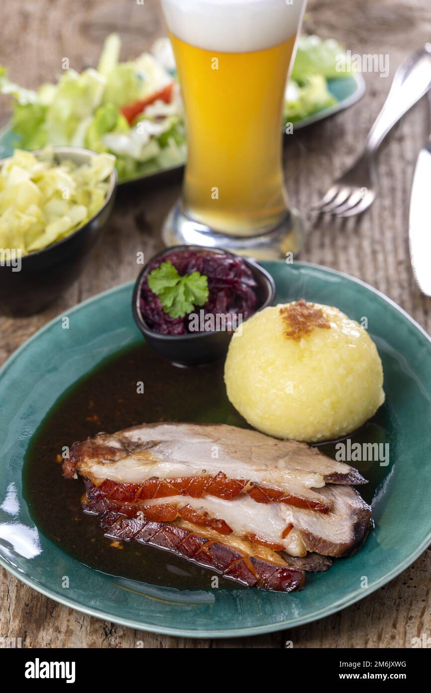 Bavarian roast pork with dumplings Stock Photo Alamy