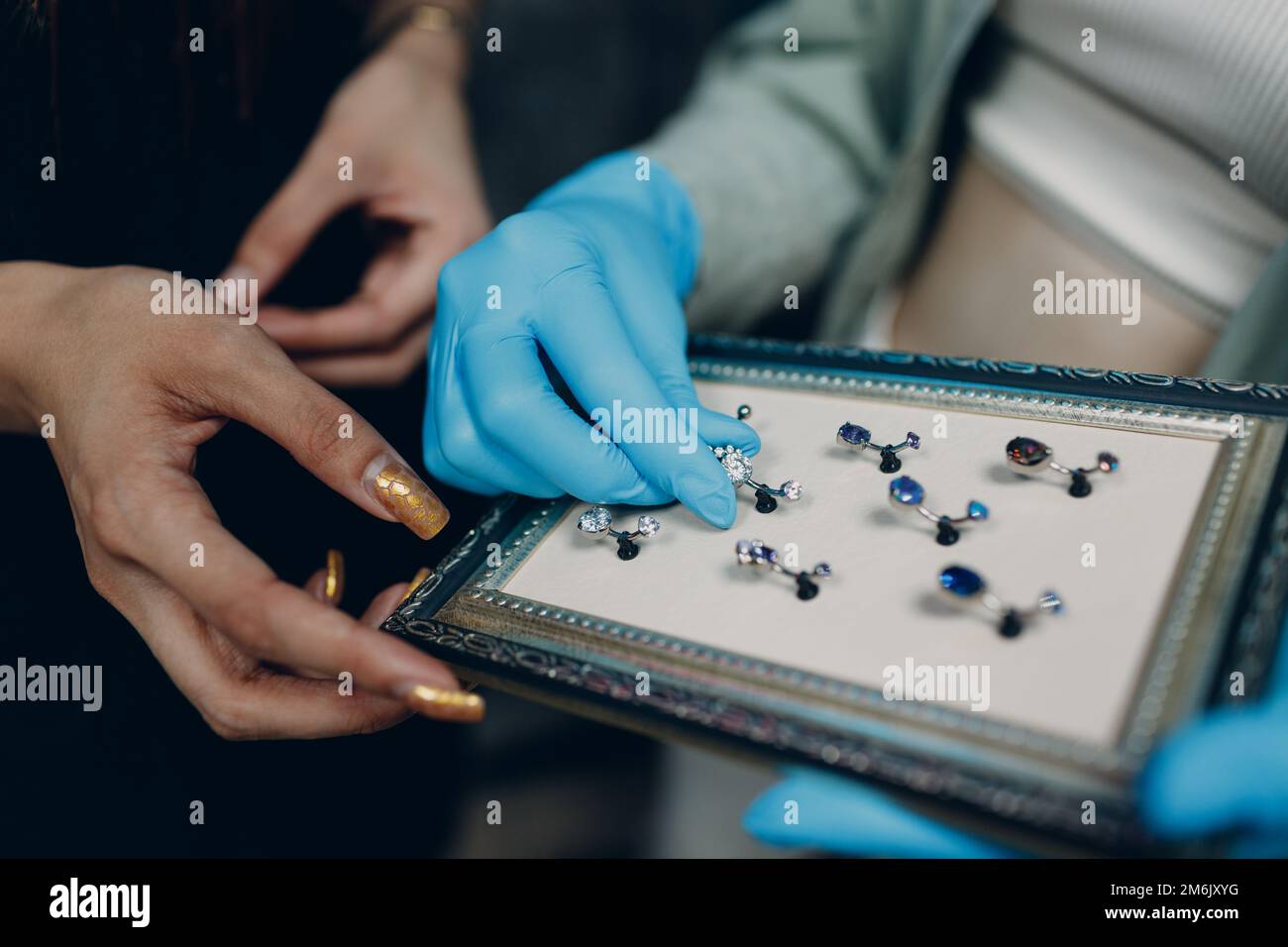 Ear piercings hires stock photography and images Alamy