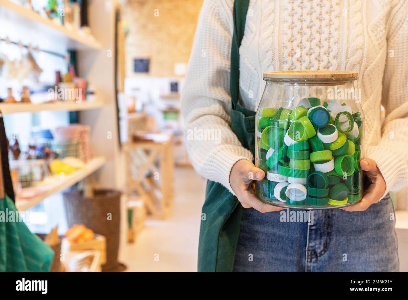 eco friendly habits hand gesture bottle with reusable lid Stock Photo ...