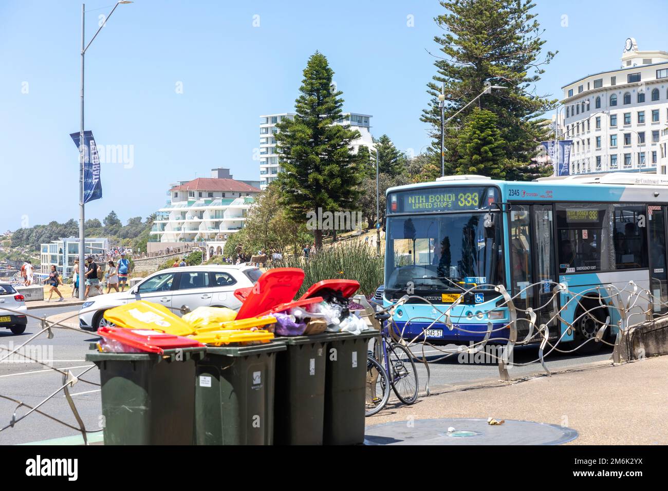 Bondi Beach Sydney street waste rubbish bins overflowing with rubbish