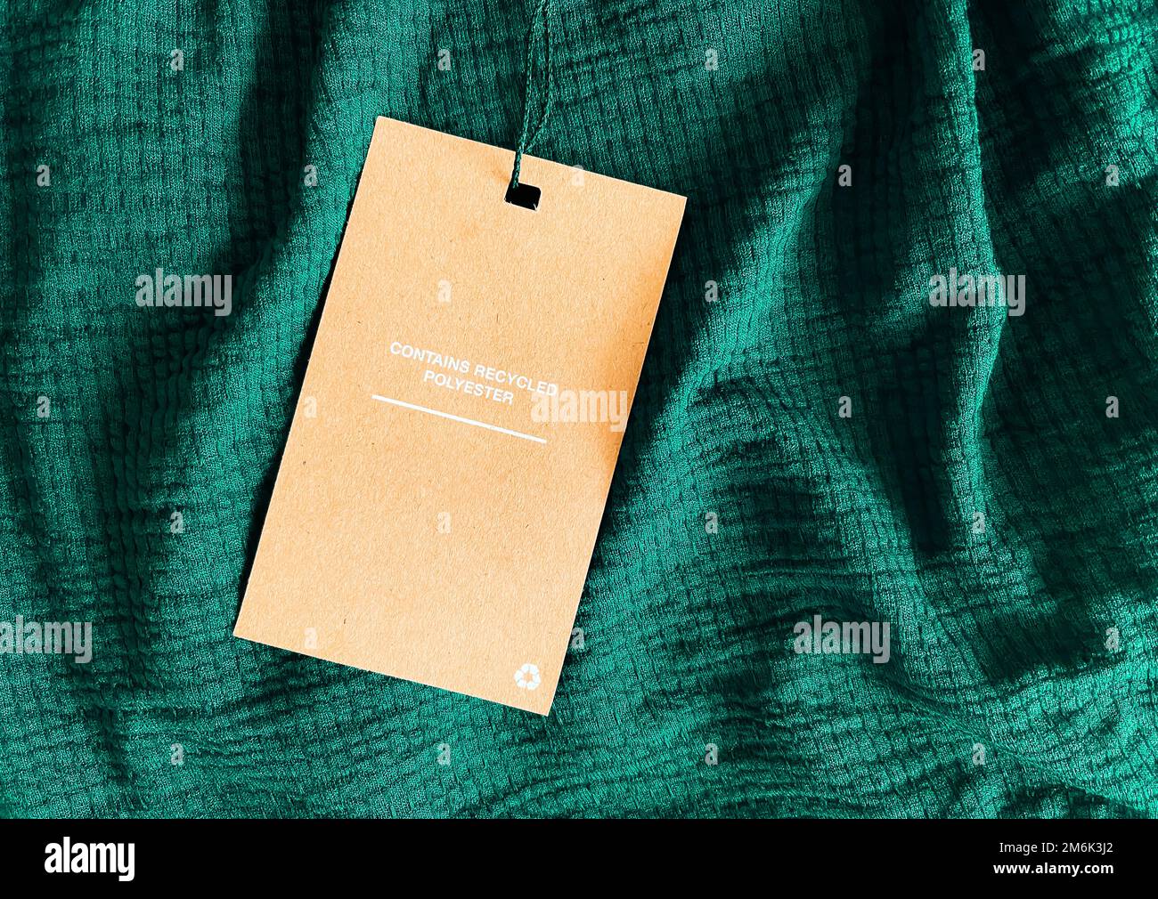 Contains recycled polyester fashion label tag, sale price card on