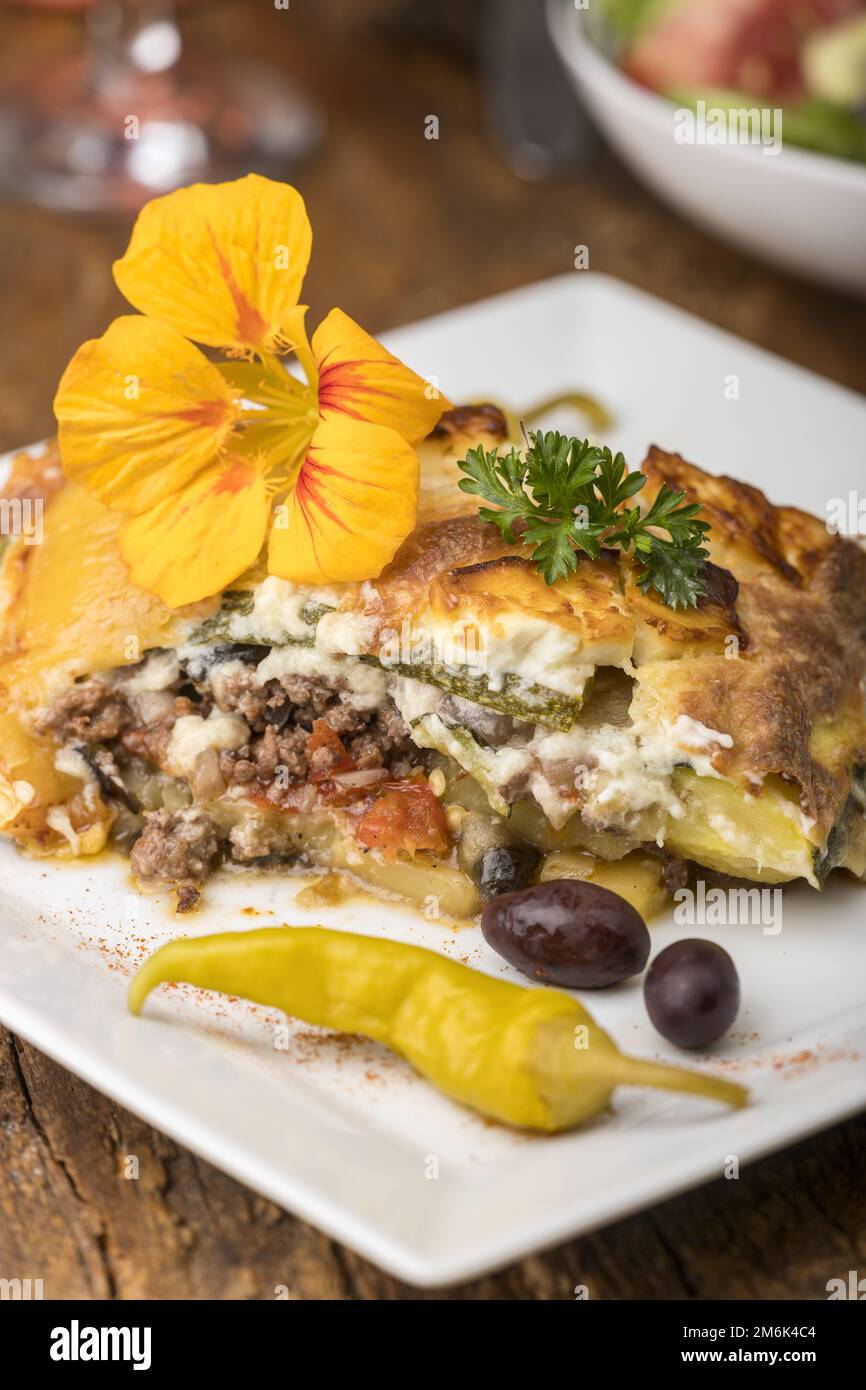 Greek moussaka on white plate Stock Photo