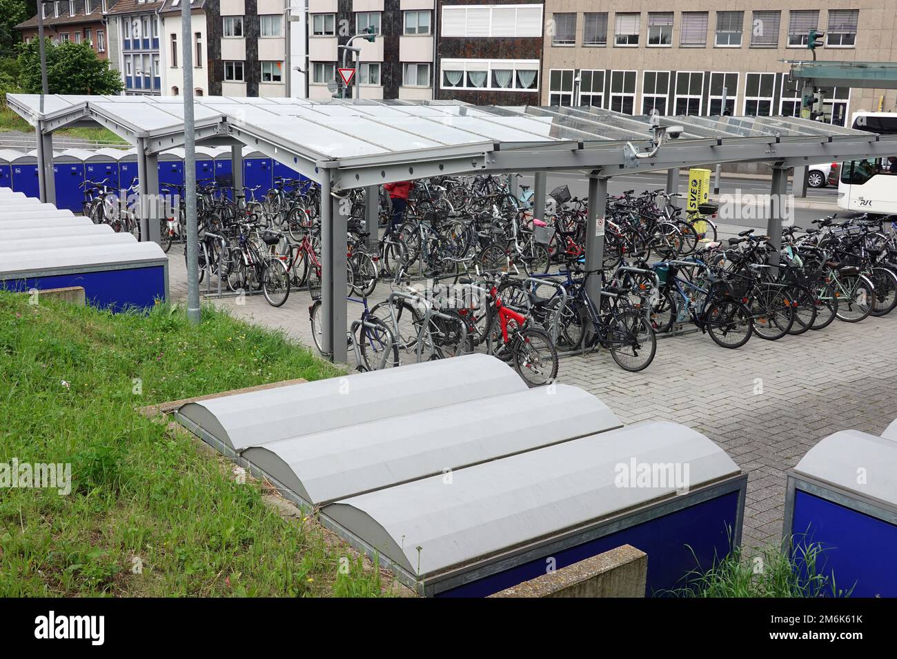 Bicycle garages and parking spaces at the station Stock Photo Alamy