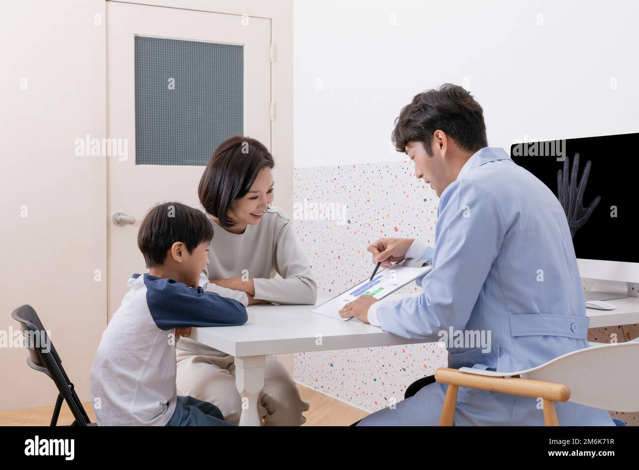 korean asian child in doctor clinic hospital growth counseling Stock Photo