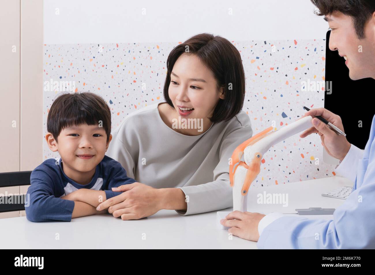 korean asian child in doctor clinic hospital growth counseling Stock Photo