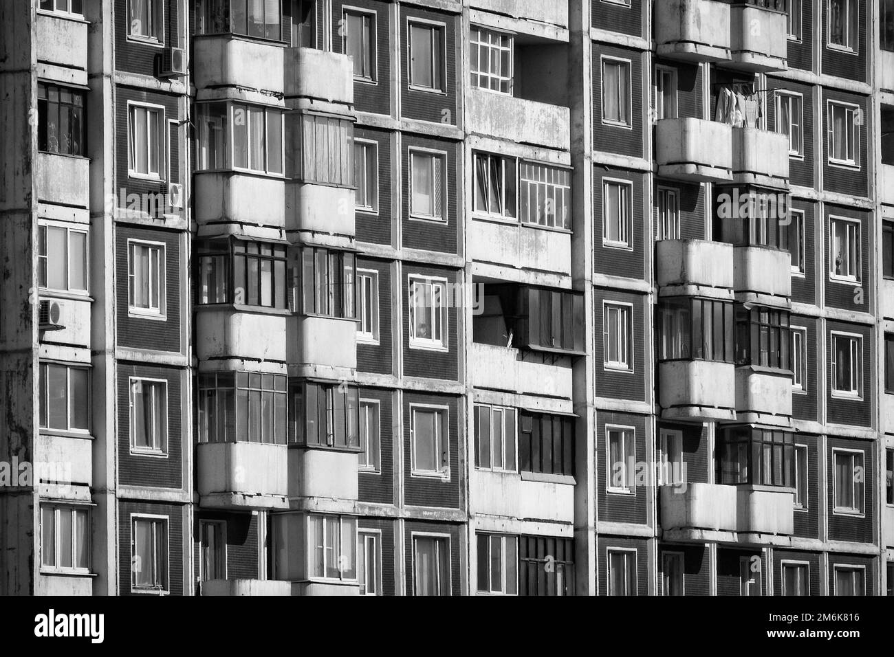 Modern apartment building. Front view. Divercity of windows. Stock Photo