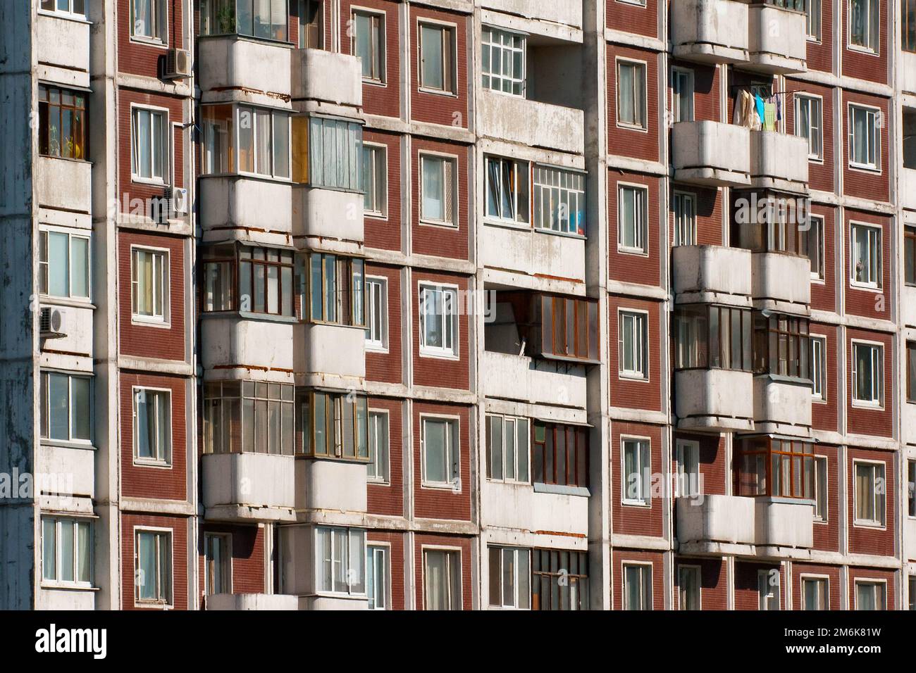 Modern apartment building. Front view. Divercity of windows Stock Photo ...