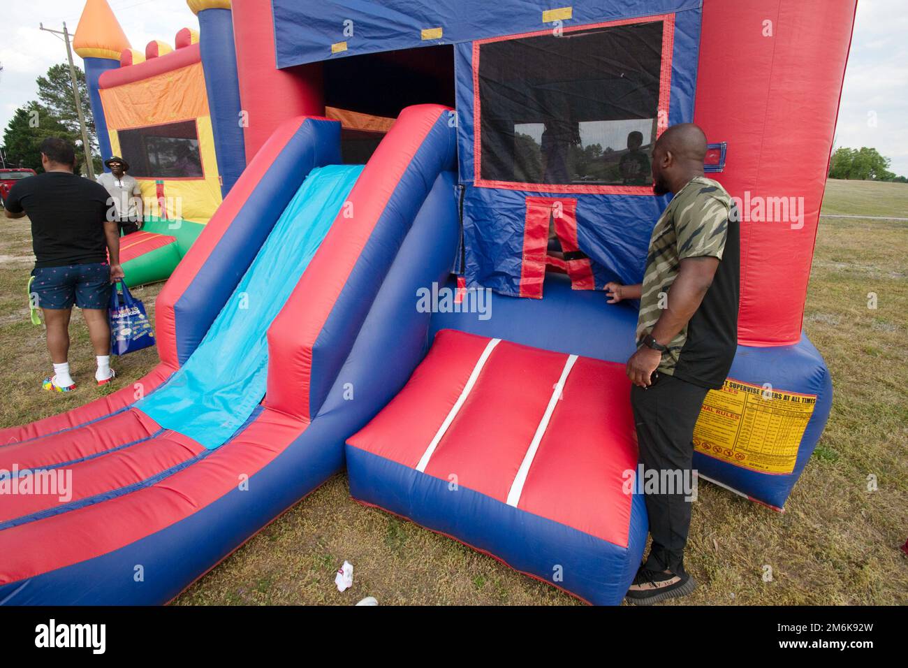 Darius Lane, Youth Sports Director, watches to ensure children are