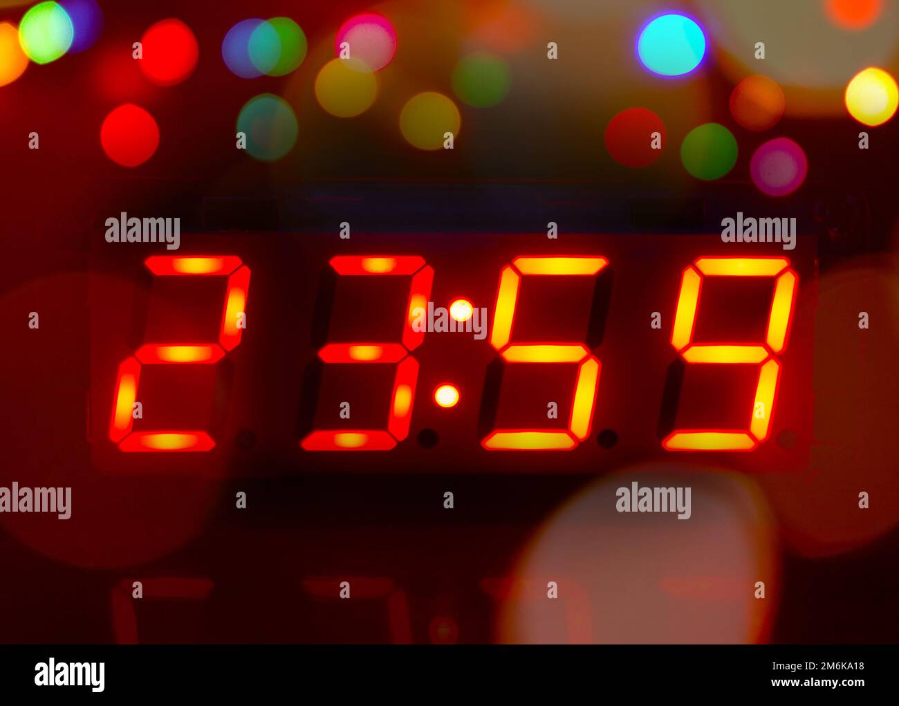 Digital clock and bokeh Stock Photo