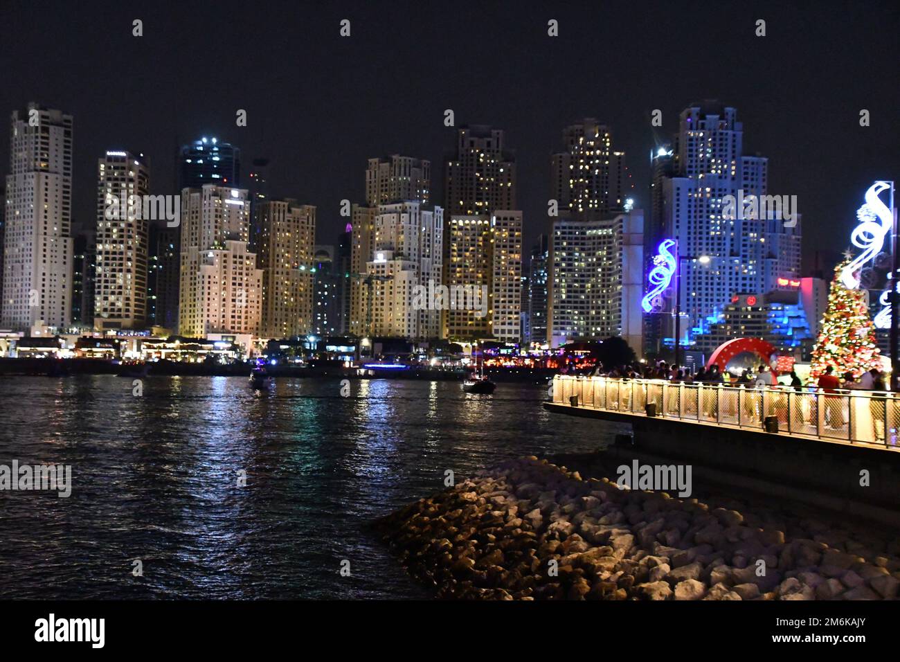 View of Jumeirah Beach Residence JBR at night, from Bluewaters Island Stock Photo