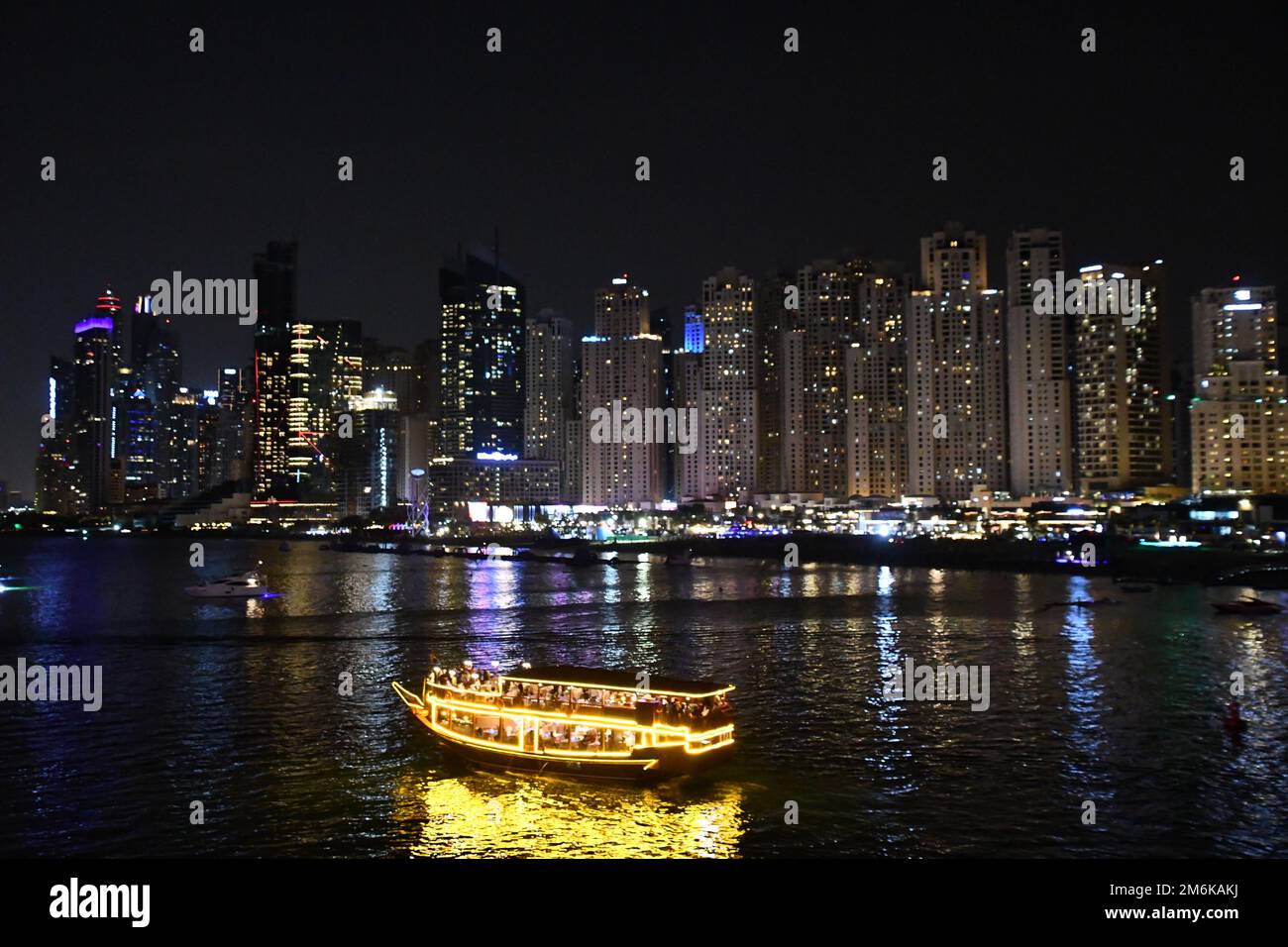 View of Jumeirah Beach Residence JBR at night, from Bluewaters Island Stock Photo