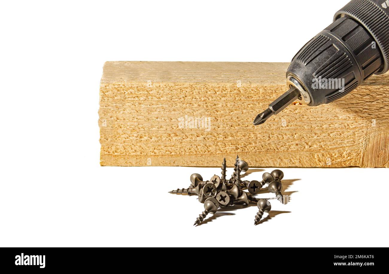 Drill with screws and wooden bar Stock Photo Alamy