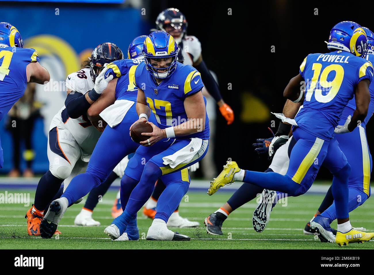 INGLEWOOD, CA - DECEMBER 25: Los Angeles Rams quarterback Baker Mayfield (17) reverse pivots from the center  during the Denver Broncos vs Los Angeles Stock Photo