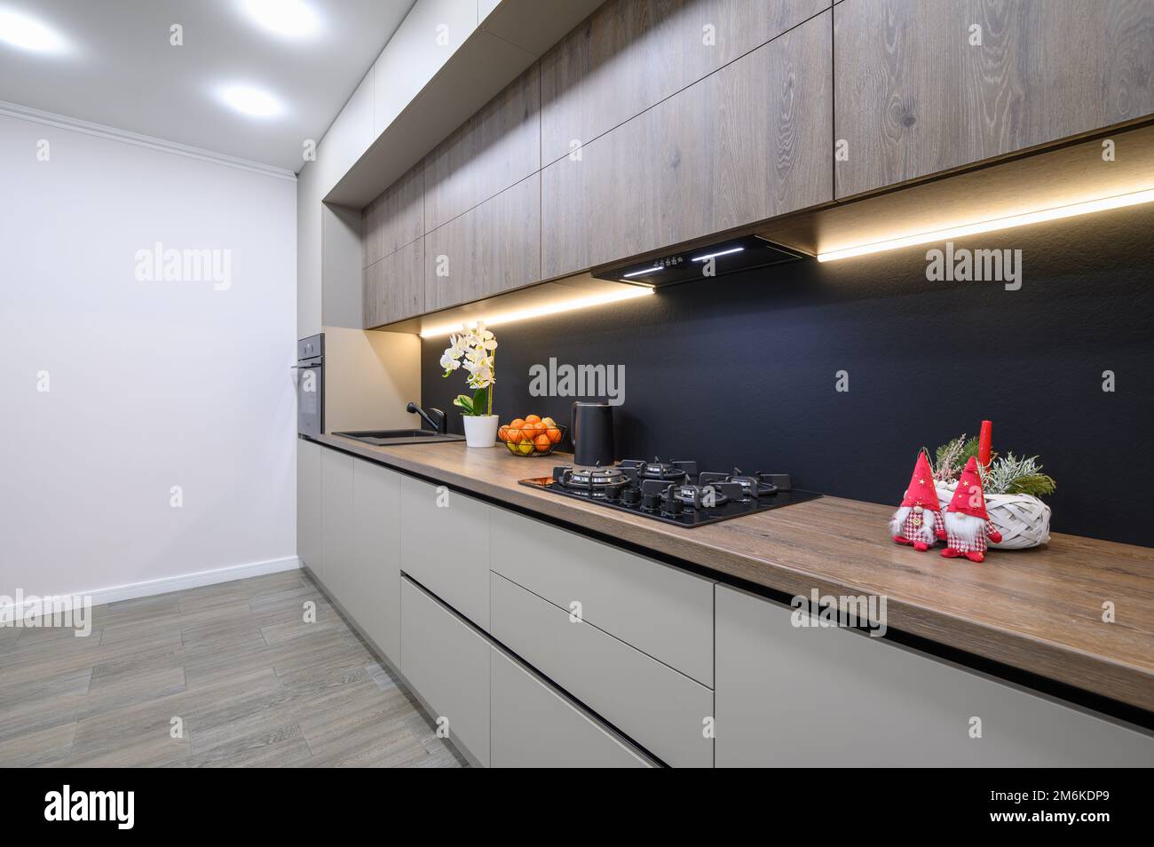 Trendy grey modern kitchen interior with minimalistic furniture Stock ...