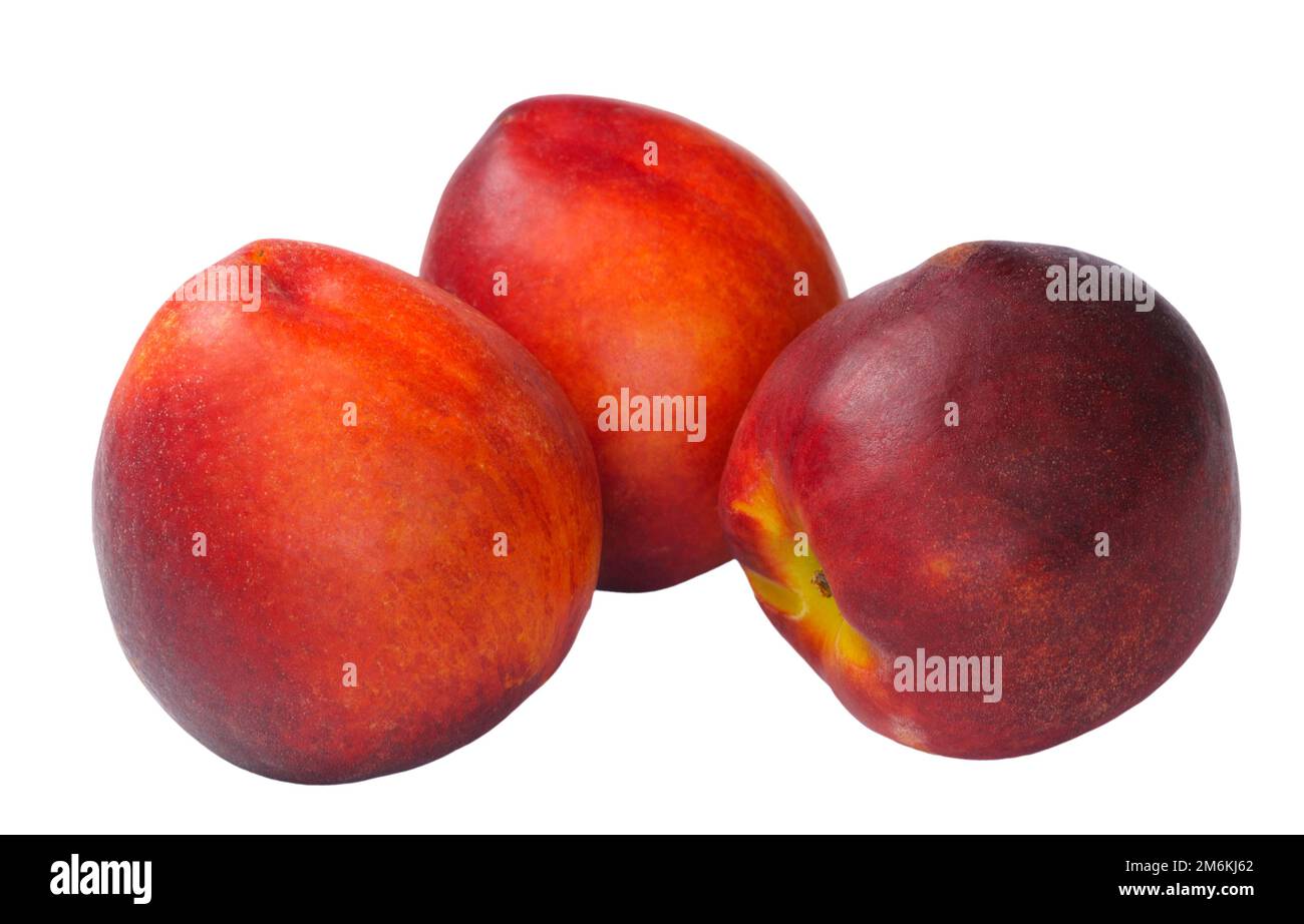 Several nectarines isolated on white background Stock Photo