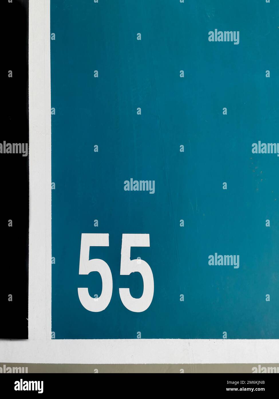 Parking numbers on a parking lot floor. Free space available, Park