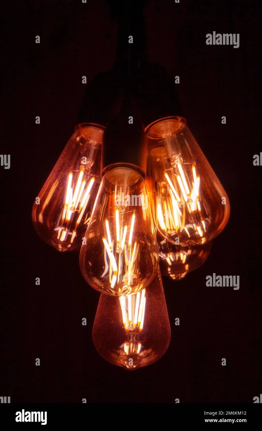 Low voltage in the power grid. Dim light bulbs Stock Photo Alamy