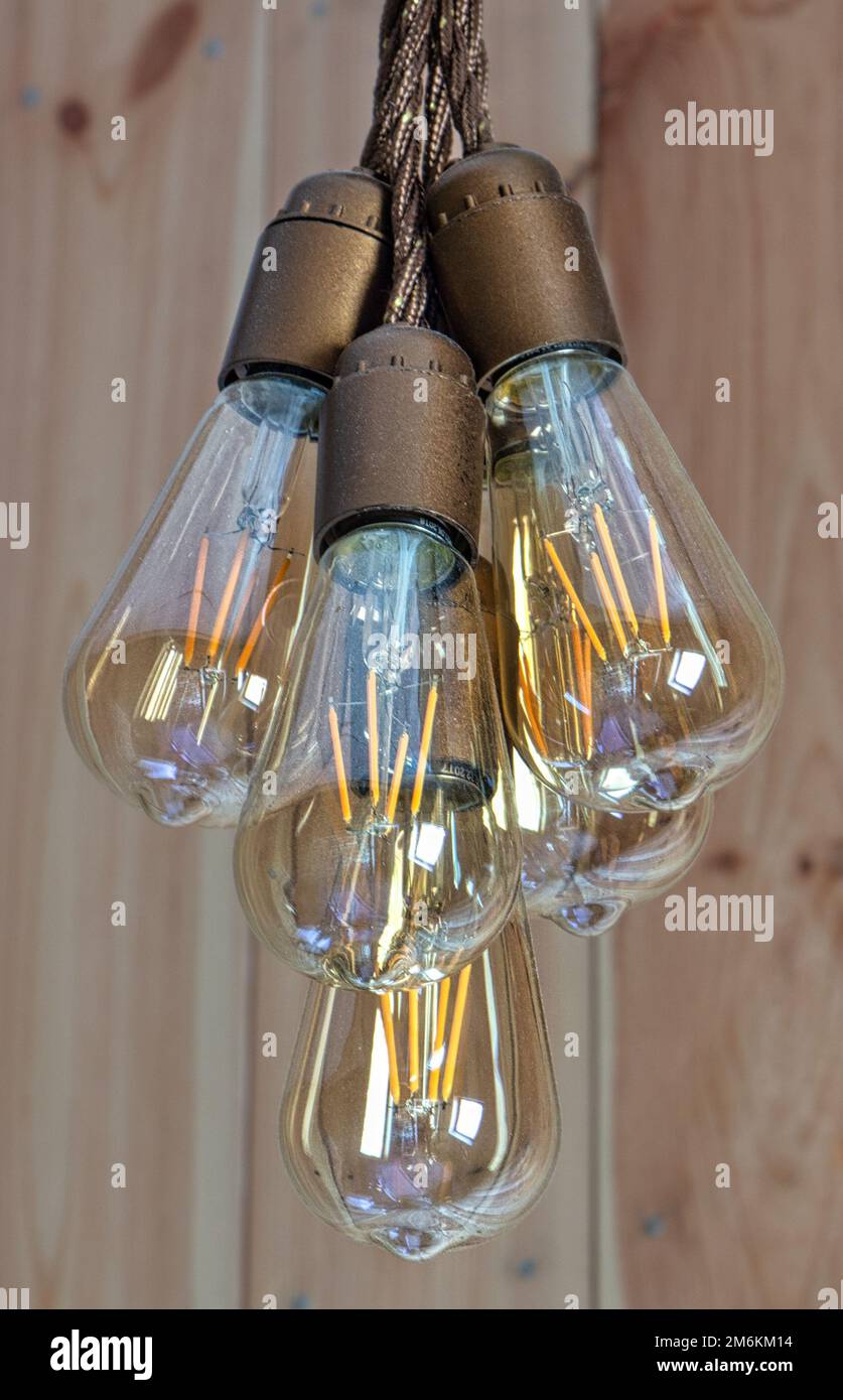 Low voltage in the power grid. Dim light bulbs Stock Photo Alamy