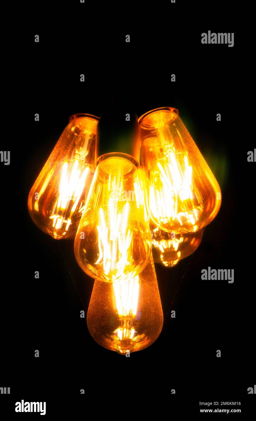 Low voltage in the power grid. Dim light bulbs Stock Photo Alamy