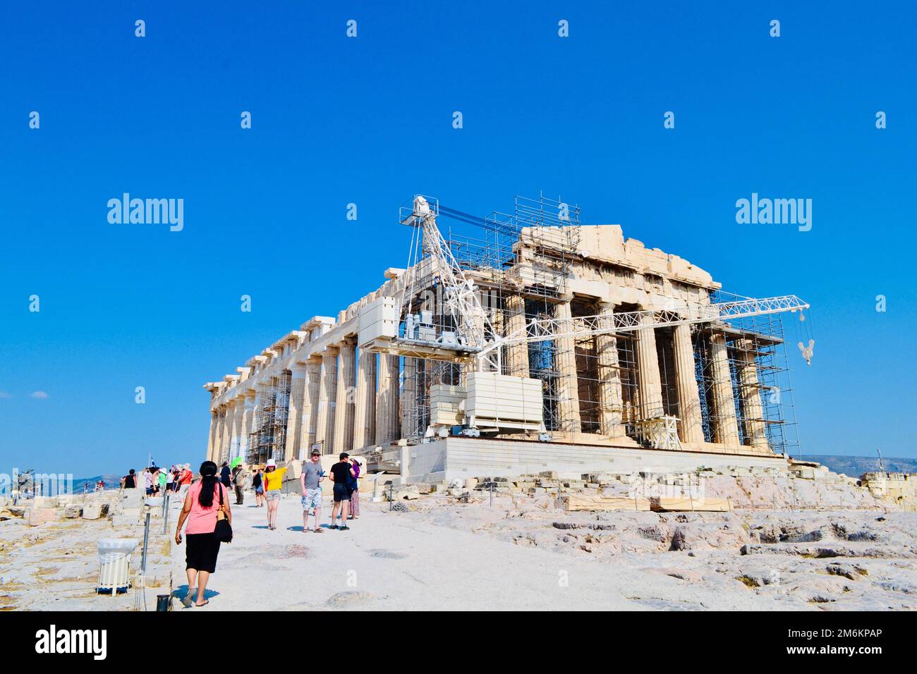 Tourists visit the Parthenon in Athens, Greece. Stock Photo