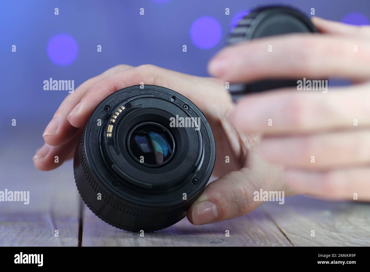 the back of the chinese lens on the table and colored background Stock Photo