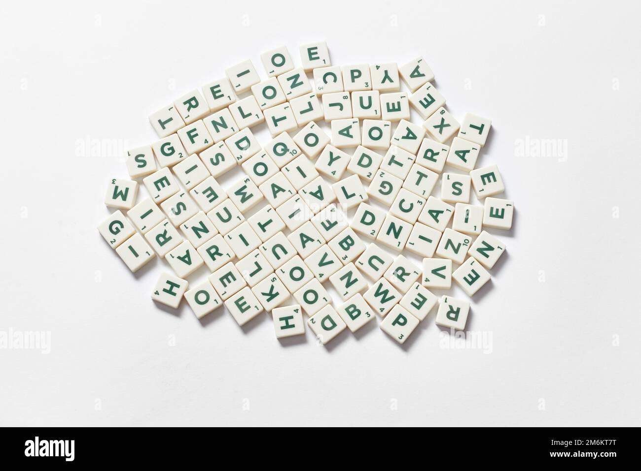 Scrabble tiles bundle on white background. Stock Photo