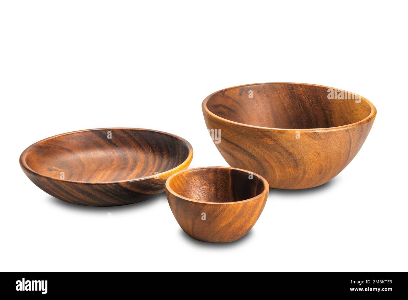 Group of empty kitchen utensils, deep wooden bowl, wooden plate and