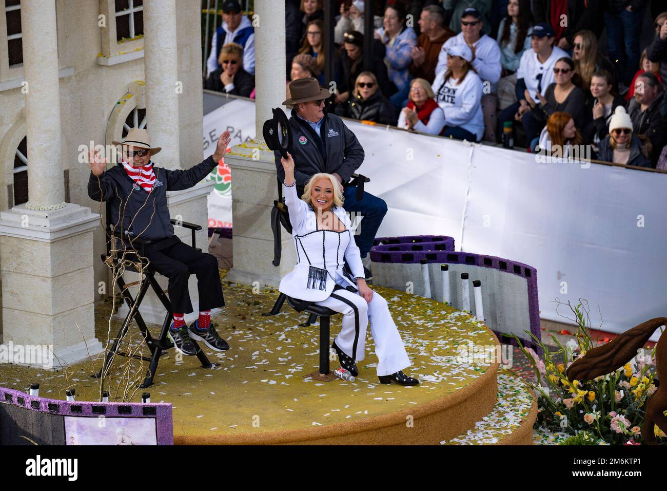 Tanya Tucker waves to the crowd from a float during the 134th annual