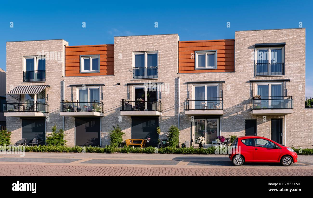 Dutch Suburban area with modern family houses, newly build modern family homes in the