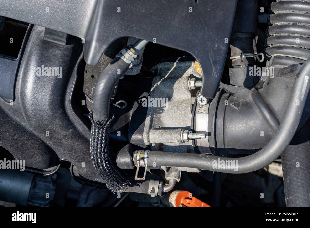 Throttle body installed of car in the engine bay Stock Photo
