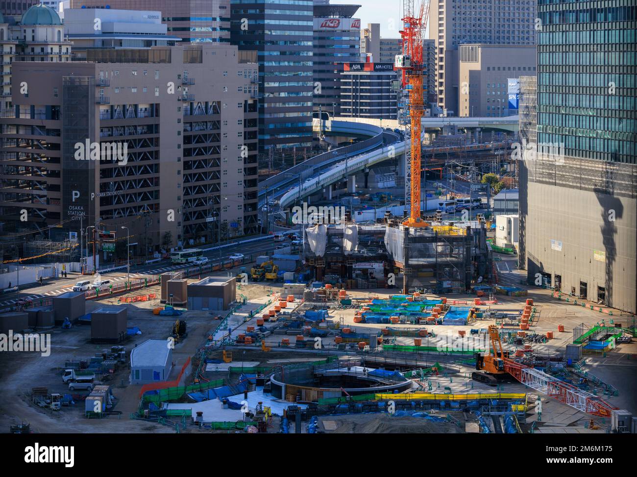 Osaka, Japan - January 3, 2023: Construction site by Gate Tower Building in city center Stock Photo
