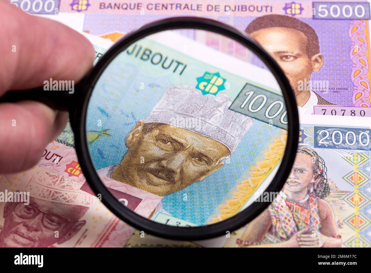 Djiboutian franc in the black wallet. Stock Photo