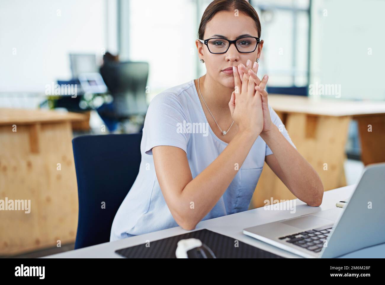 Developing tomorrows tech today. a designer at their workstation in an office. Stock Photo