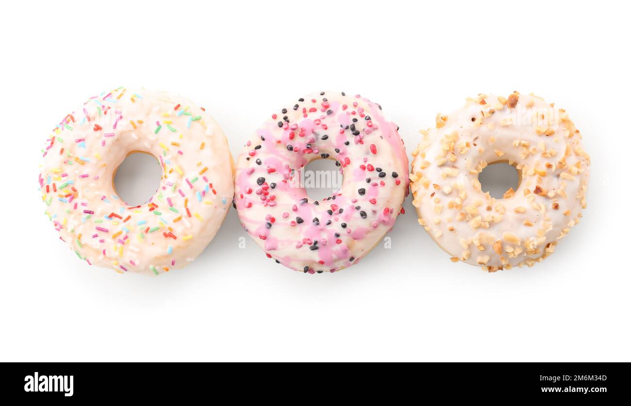 Sweet glazed donuts isolated on white background Stock Photo - Alamy