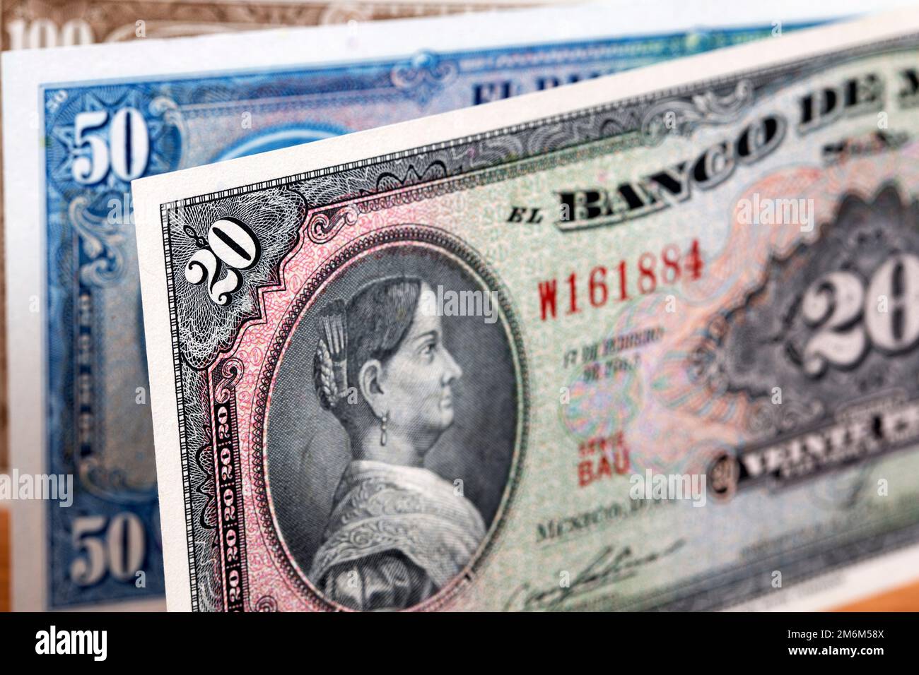 Old Mexican peso a business background Stock Photo