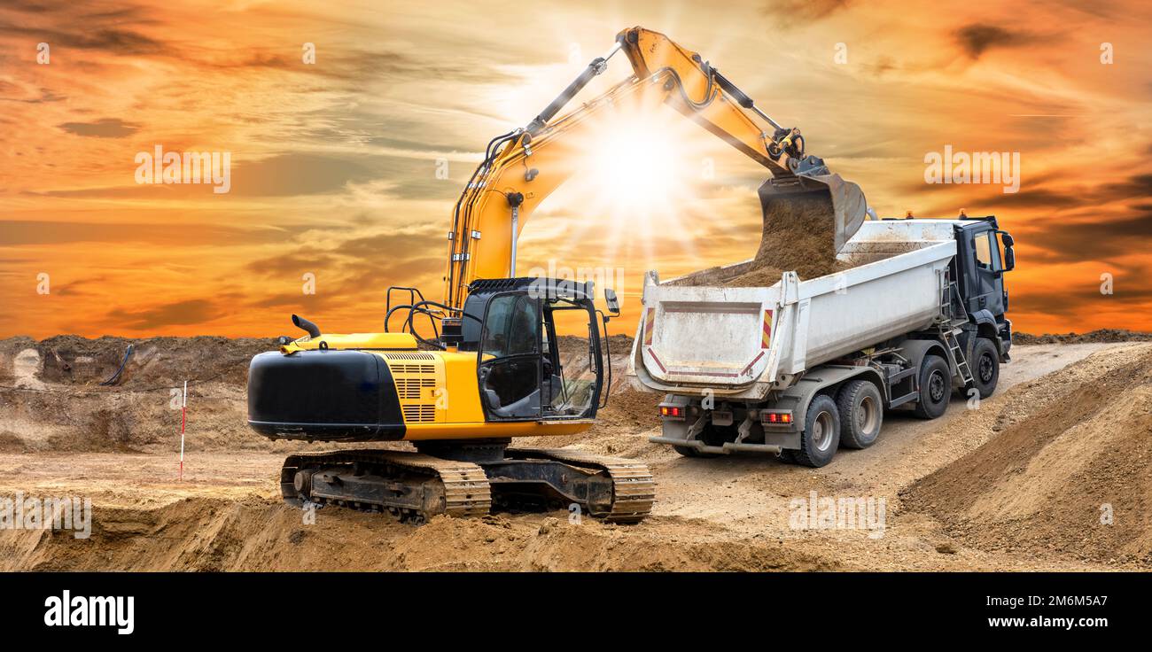 Excavator working on a construction site Stock Photo - Alamy
