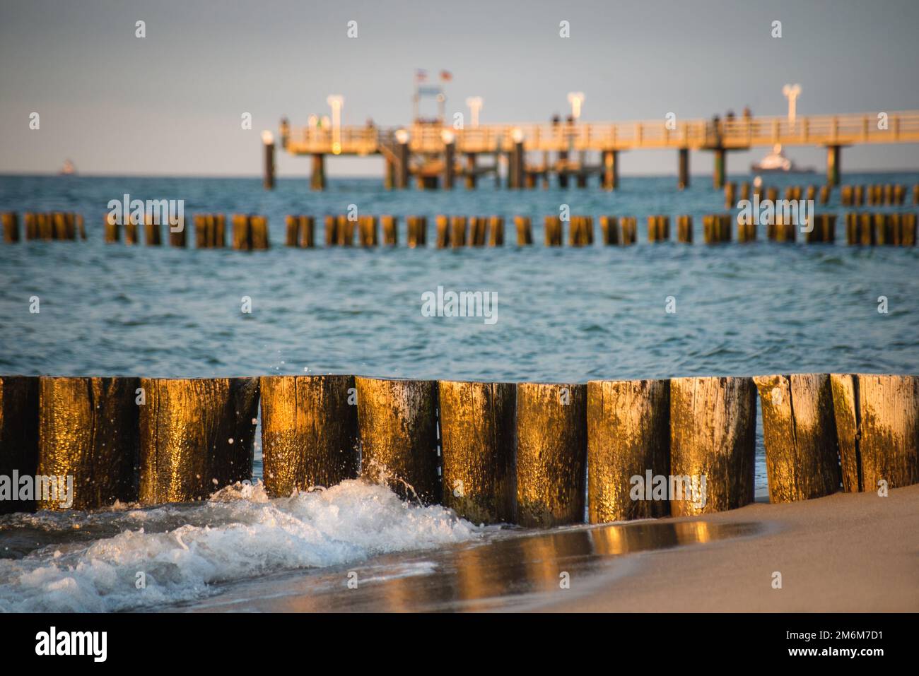 Breakwater polls on the beach of KÃ¼hlungsborn baltic sea Stock Photo