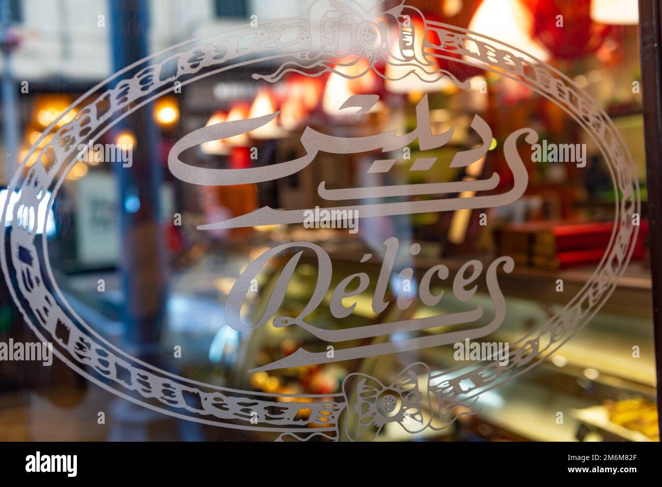 Alexandria, Egypt. December 4th 2022 Entrance to Délices Patisserie Alexandria, serving Middle Eastern food alongside pastries, cakes & coffee, one of Stock Photo