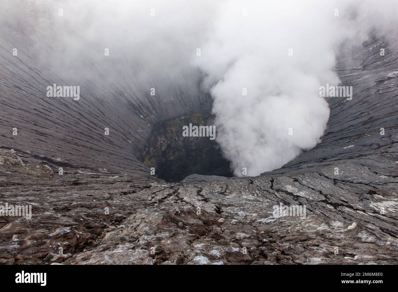 Gas and steam from Bromo volcano crater, Java island, Indonesia. Stock Photo
